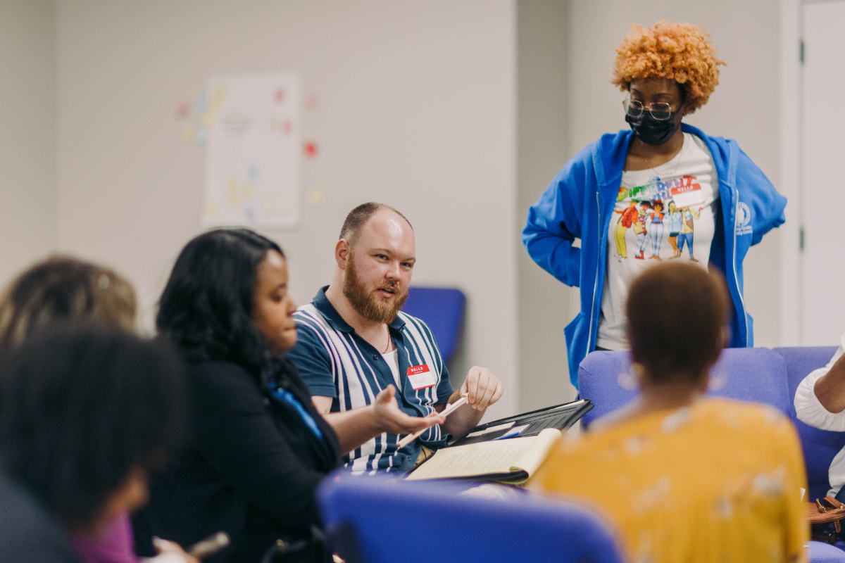 Solutions Circles members talking at the first gathering of 2023