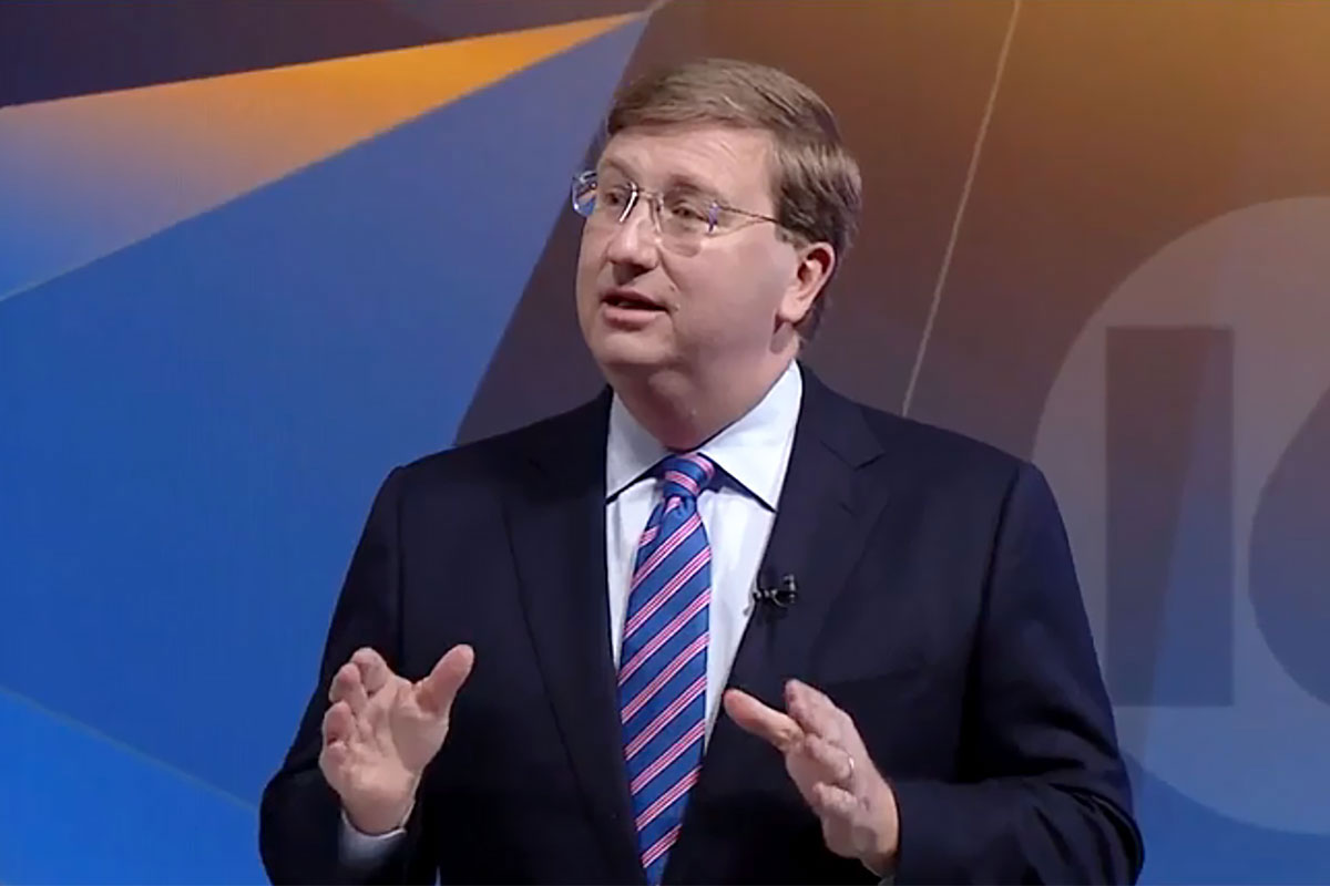 Tate Reeves speaking at a debate