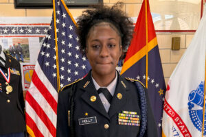 Quintoria Holly smiling in her JROTC uniform