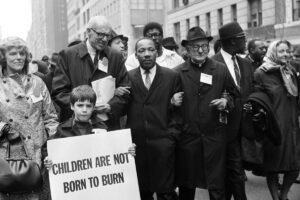 Civil rights leader Martin Luther King Jr., center, leads an anti-Vietnam War demonstratio