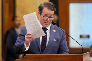 Mississippi State Rep. Fred Shanks, R-Brandon, waves a copy of his proposed resolution