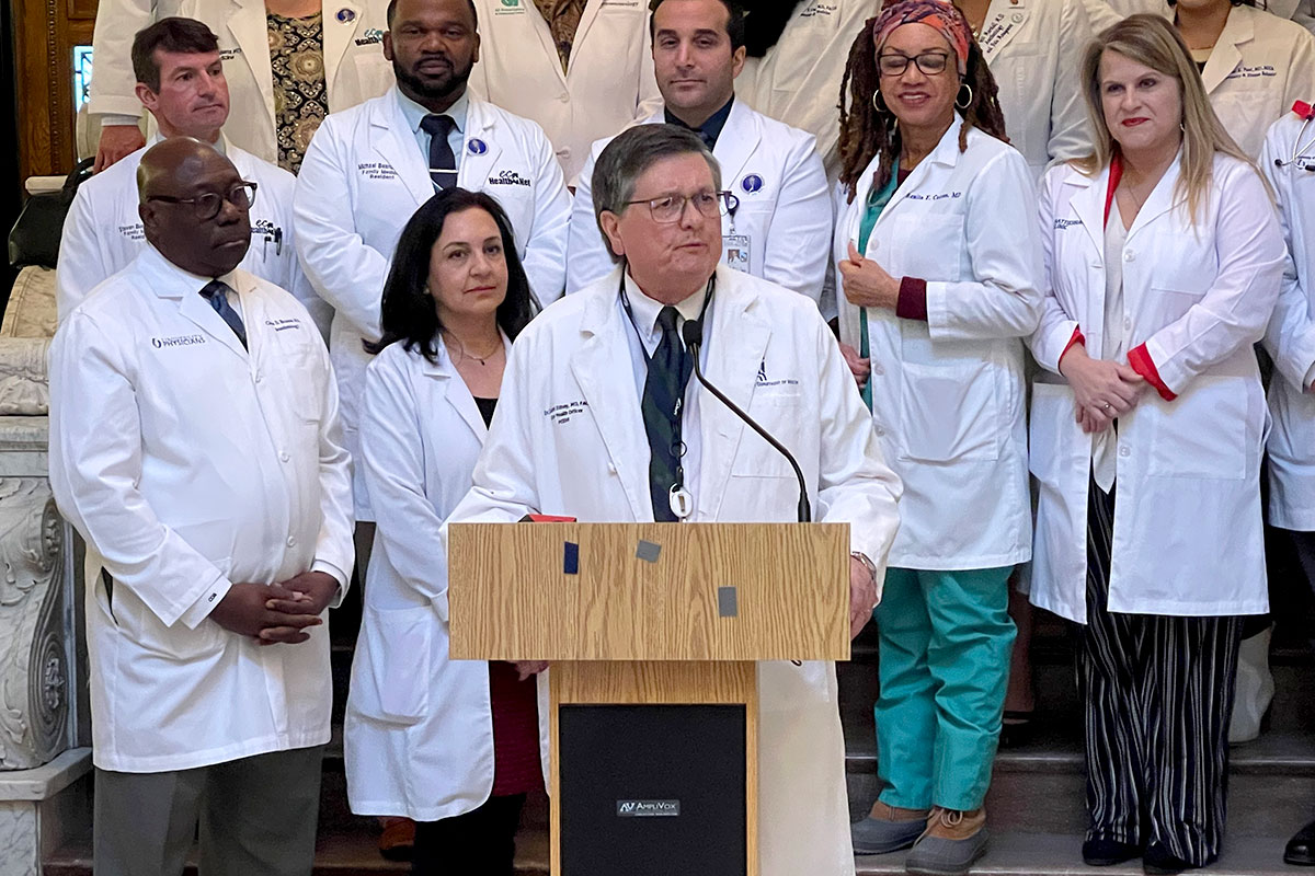 State Health Officer Dr. Dan Edney speaking at an event
