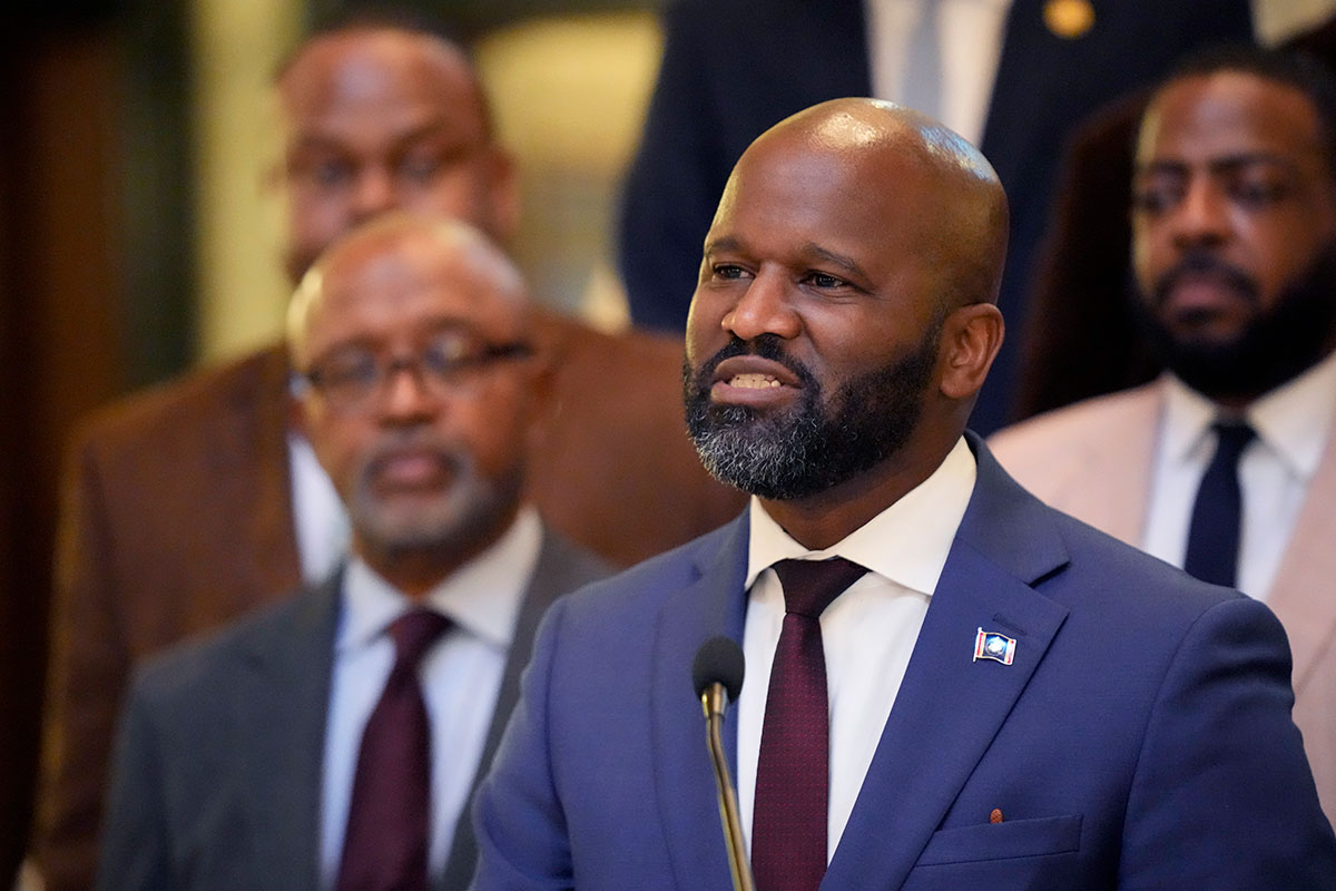 Democrat Ty Pinkins speaks in front of Black Mississippi state legislators