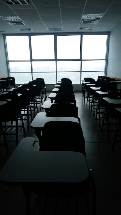 rows of empty school desks (teachers)
