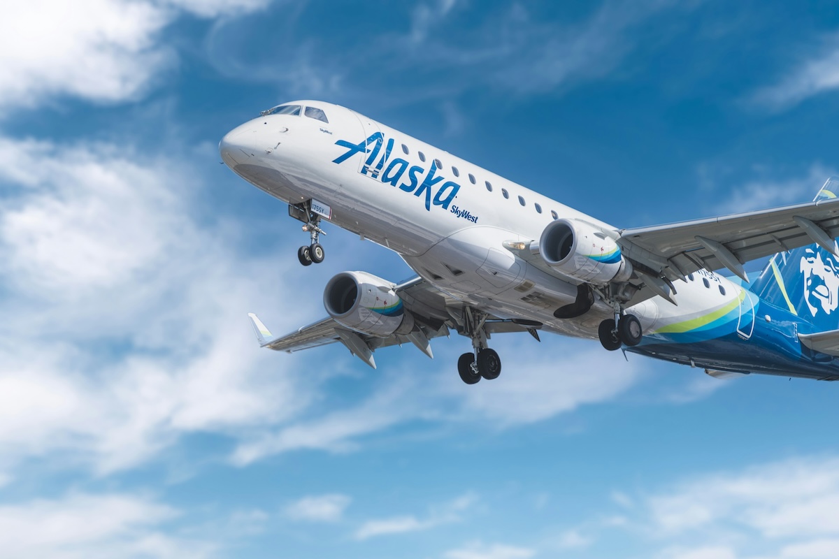 Alaska Airlines jet flying in sky