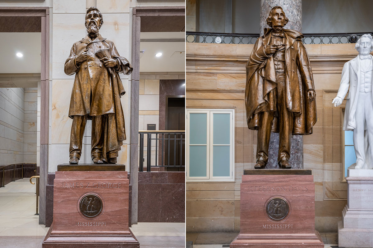 Side by side bronze statues of James Zachariah George and Jefferson Davis