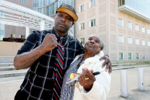 Eddie Terrell Parker and his aunt Linda Rawls express their joy in front ot the Mississippi federal courthouse