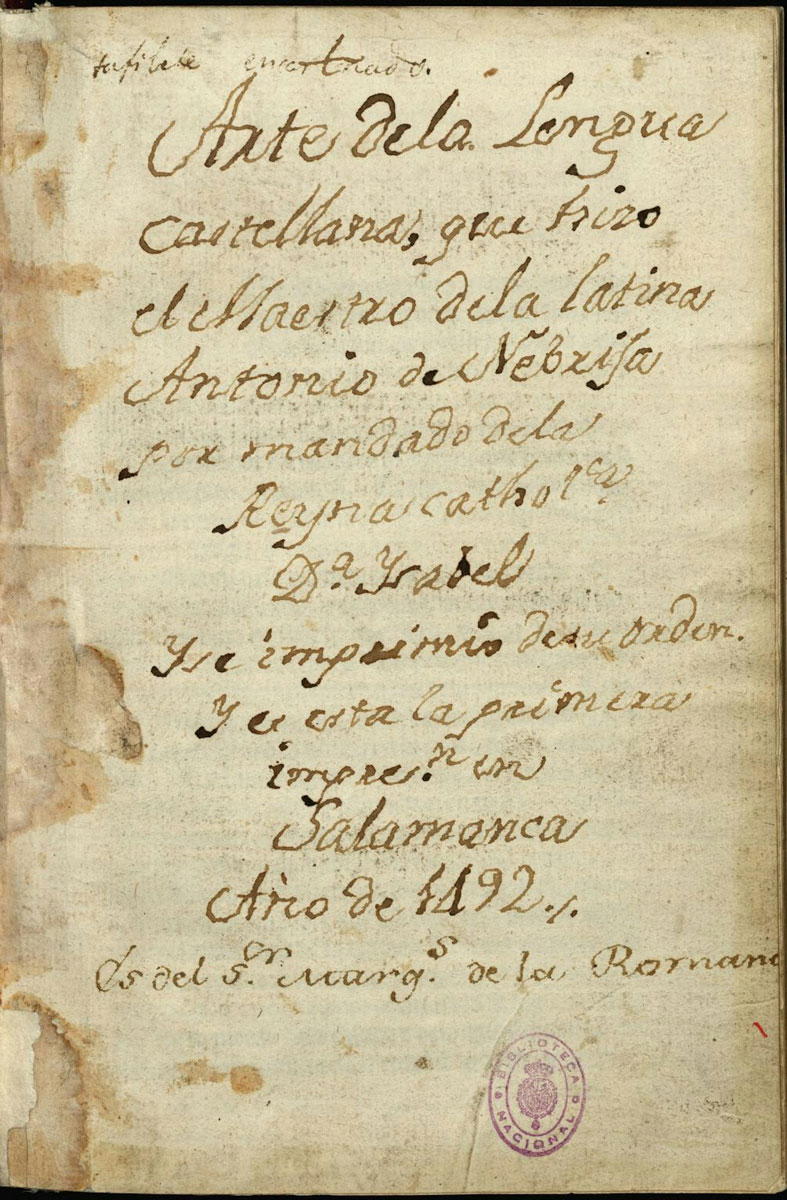 Yellowed manuscript with written text inscribed in ink down the page