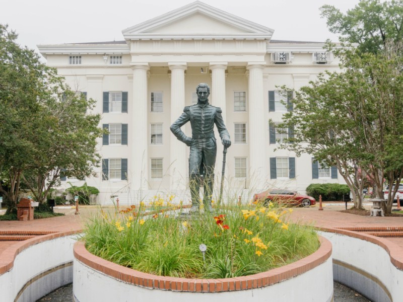 a photo of a statue of Andrew Jackson in front of city hall
