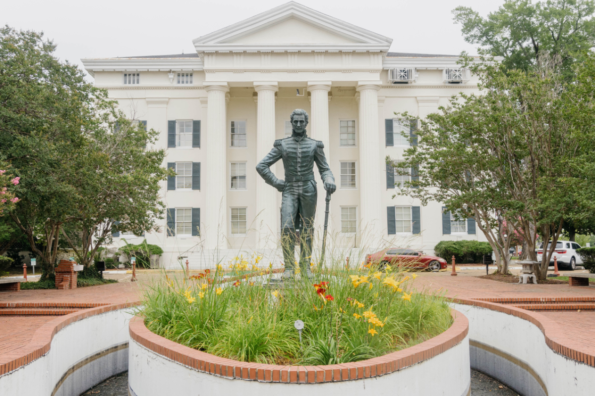 a photo of a statue of Andrew Jackson in front of city hall