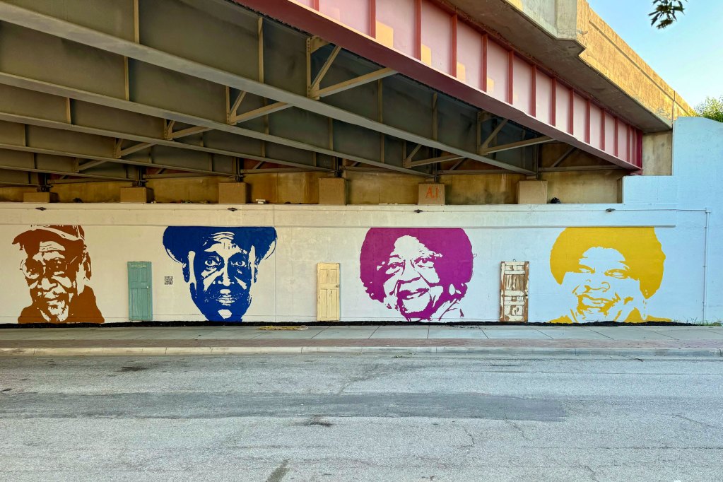 Doorways to Hope art installation under a highway bridge
