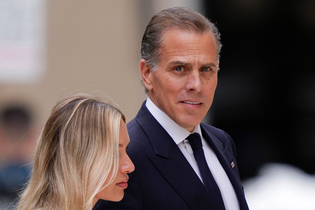 Hunter Biden, accompanied by his wife