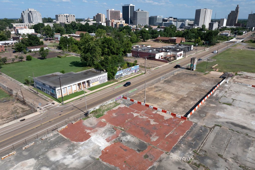 An aerial photo of an empty lot with a view of downtown Jackson, Miss. in the background.