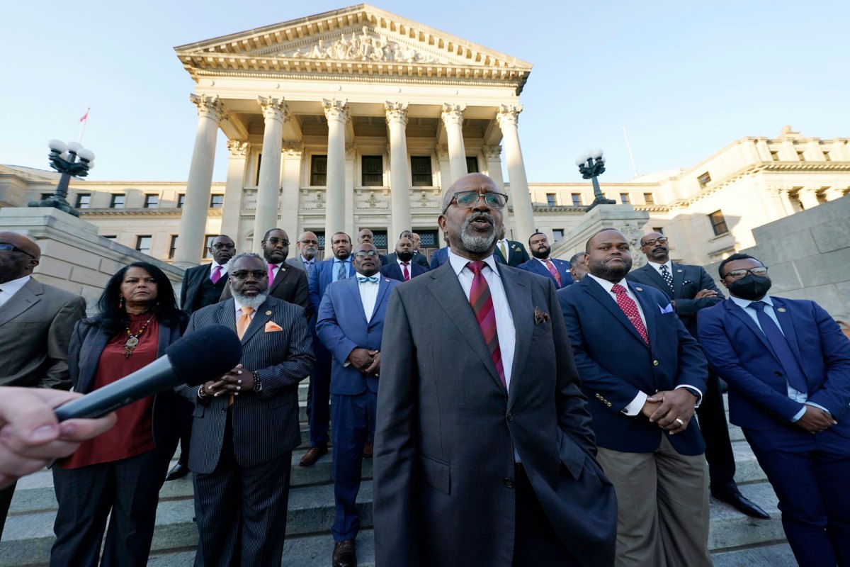 Black Democratic lawmakers standing on the steps of the Capitol