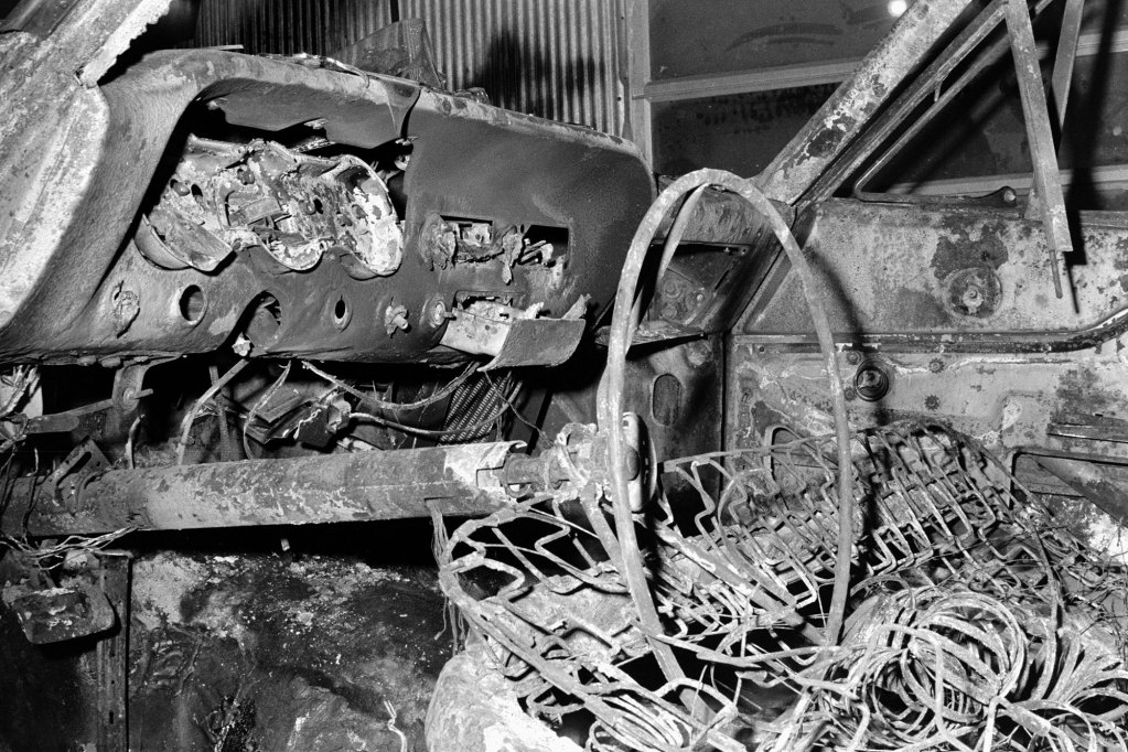 The interior of a burnt out station wagon