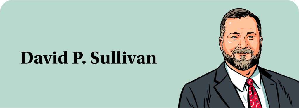 An illustration of David P. Sullivan, a White man with gray hair and a gray beard, wearing a suit and tie.