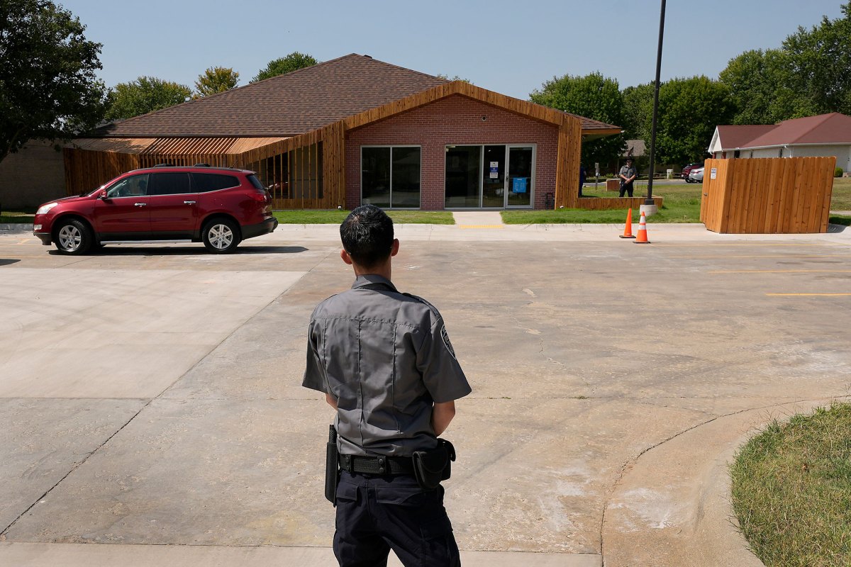 Security personnel stand outside a recently opened Planned Parenthood clinic