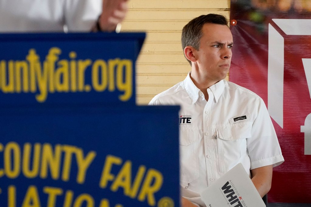 State Auditor Shad White stares around the pavilion at the Neshoba County Fair