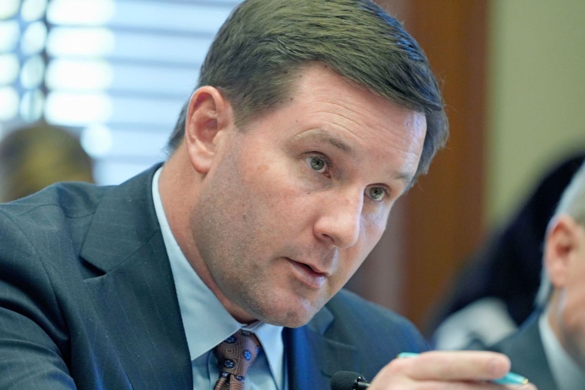 Closeup of a man in a suit talking