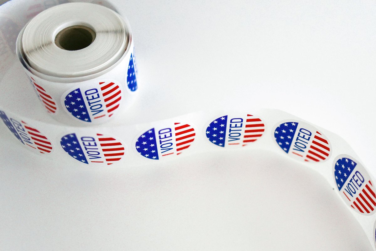 a roll of stickers that say I Voted