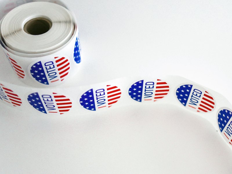 a roll of stickers that say I Voted