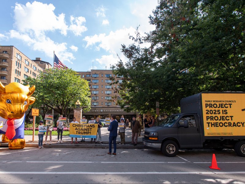 Golden Calf and a truck that says Project 2025 is Project Theocracy