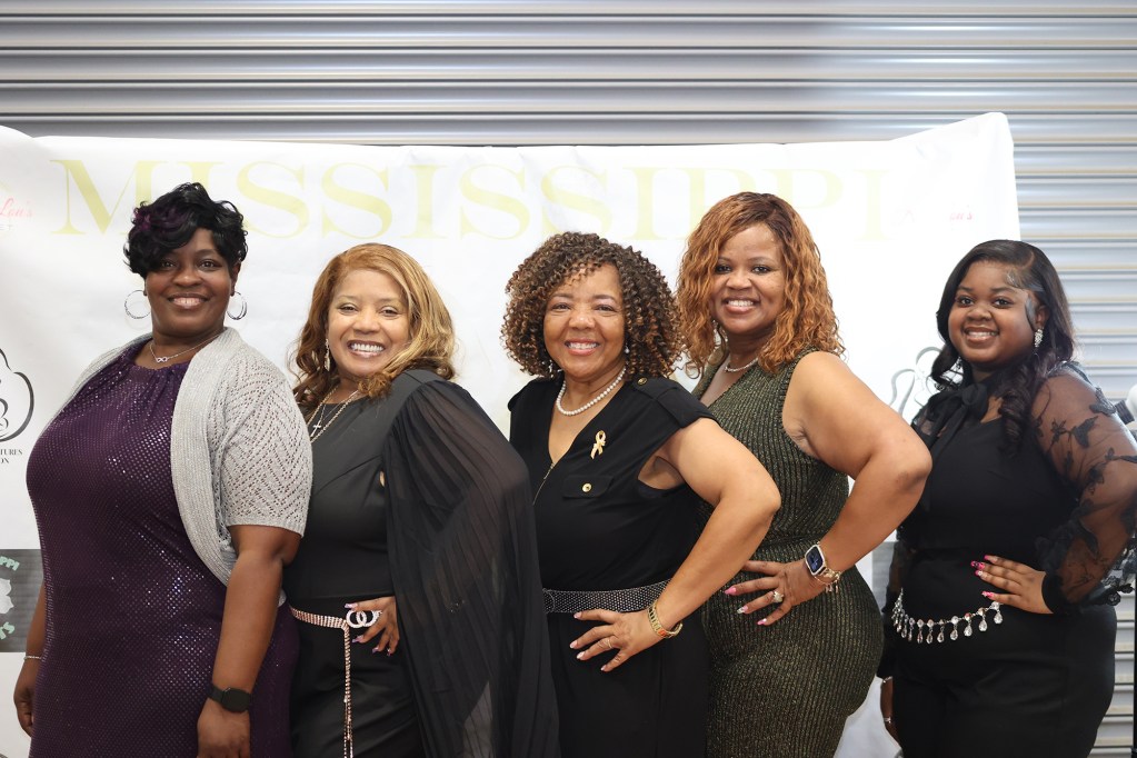 Black women at a Mississippi red carpet event.