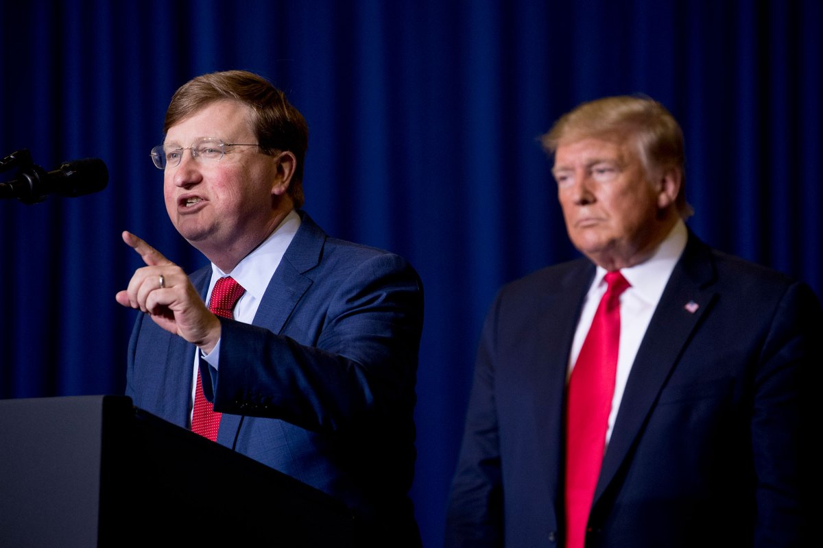 Mississippi Lt. Gov. Tate Reeves, left, accompanied by President Donald Trump