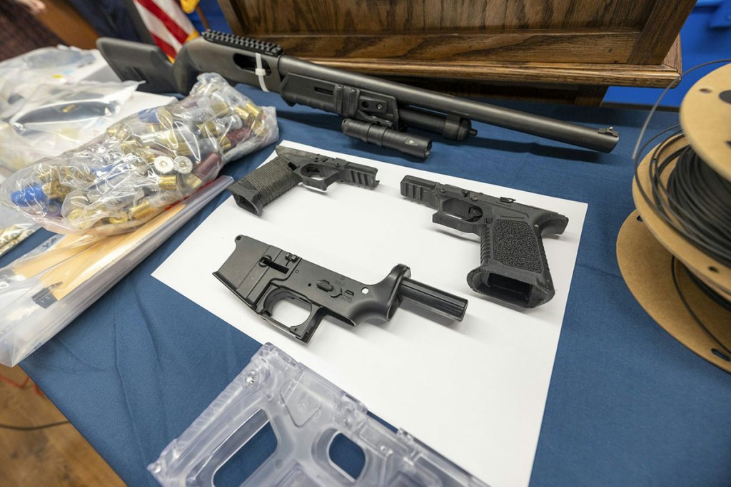 A group of firearm parts on a table