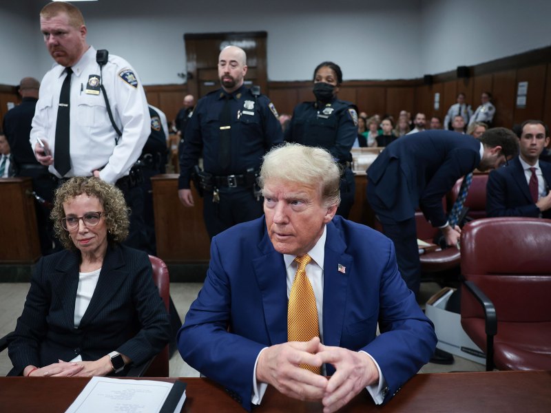 Former President Donald Trump, center, and attorney Susan Necheles, left, attend his trial at Manhattan criminal court