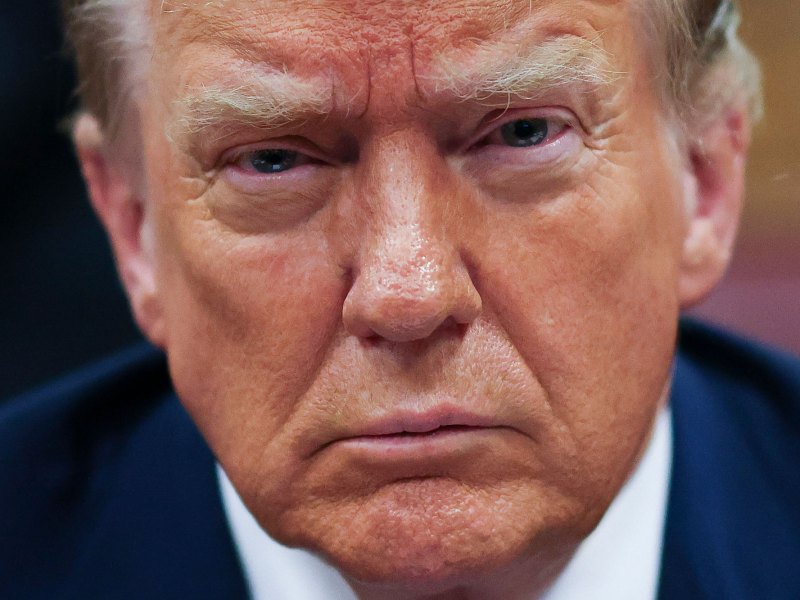 An extreme closeup of former president Donald Trump's face