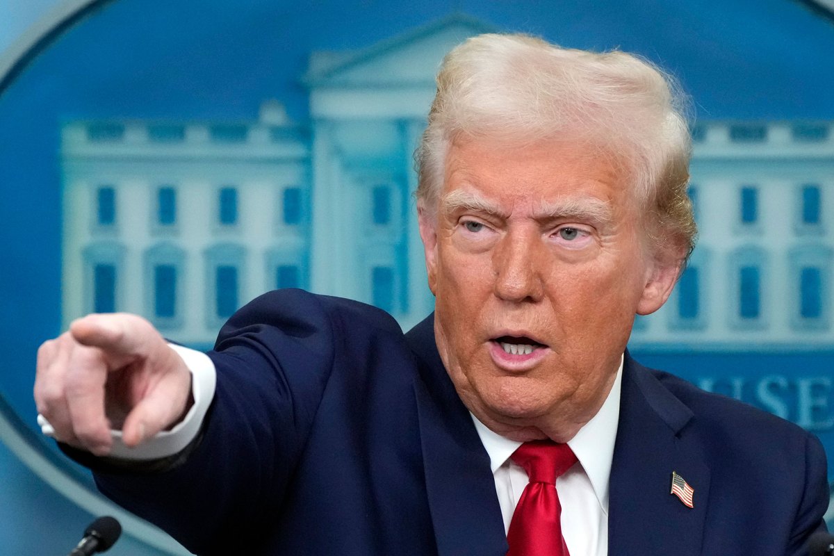 President Donald Trump calls on a reporter to ask a question