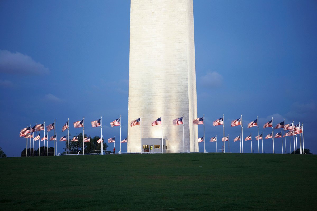 A circle of flags around the Washington Monument