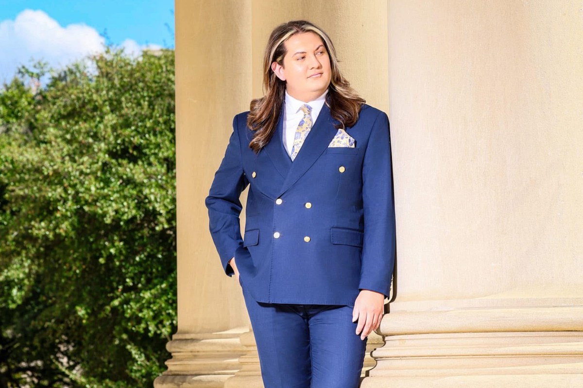 Man outside in blue suit