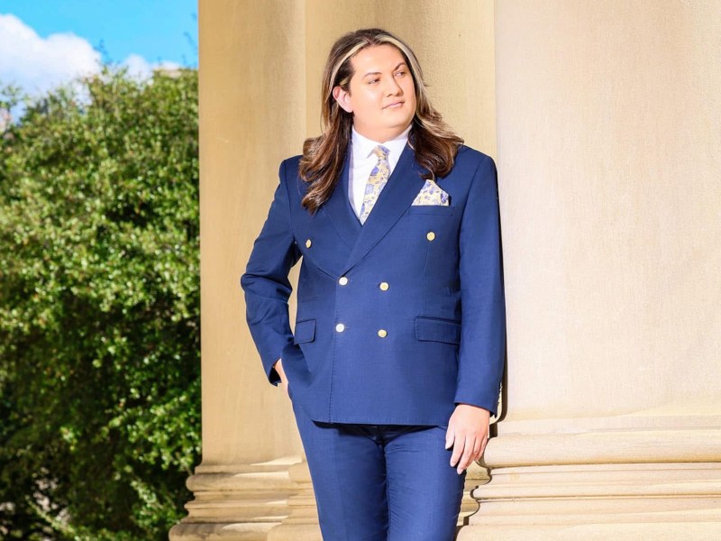 Man outside in blue suit