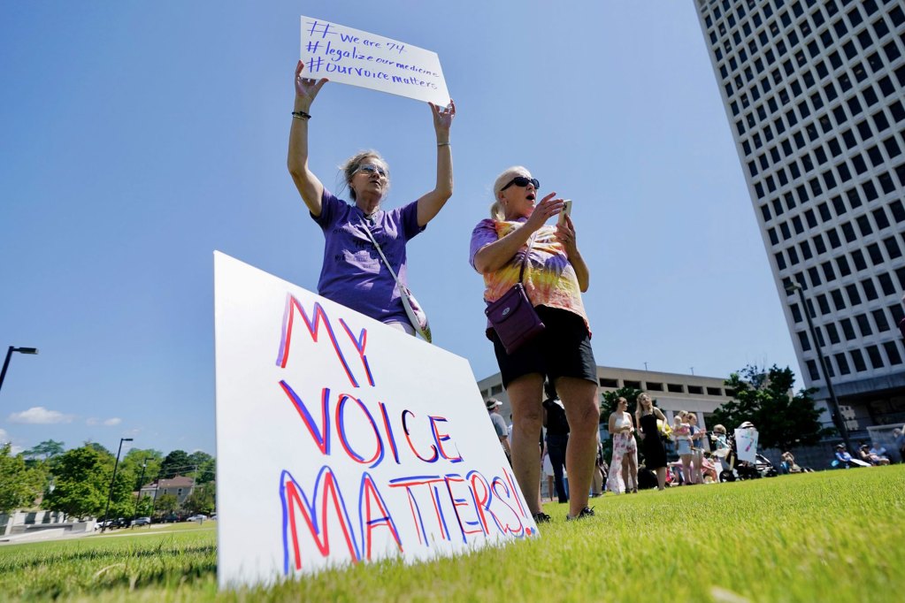 Protestors holding up signs that say My Voice Matters