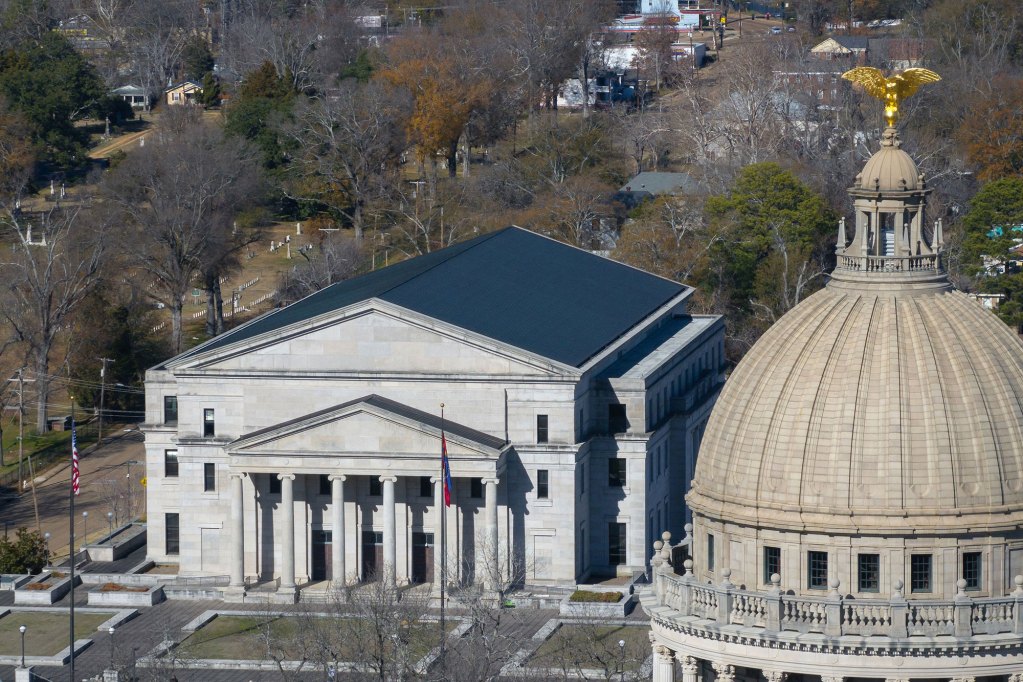 A photograph taken from a high vantage point of the Supreme Court of Mississippi and the Mississippi State Capitol building in Jackson, Miss., on a sunny winter day.
