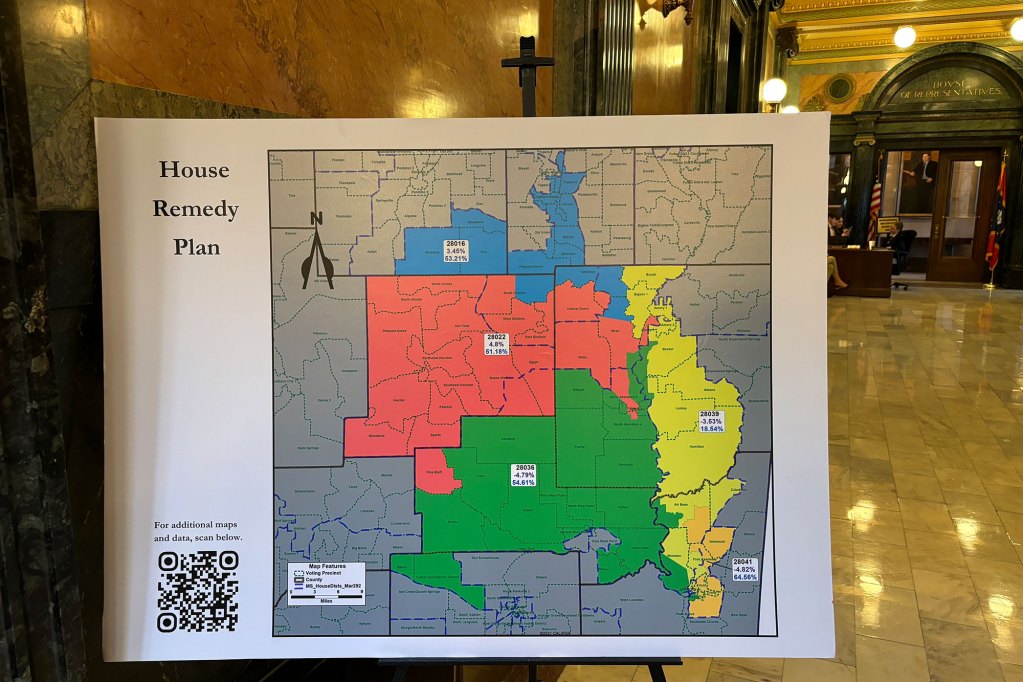 The Mississippi Senate’s redistricting map is displayed on a table.