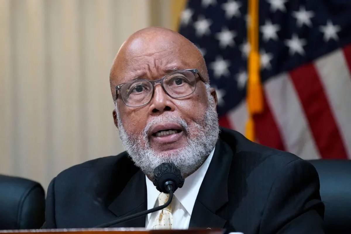 Bennie Thompson speaks at a mic. The US Flag can be seen behind him.