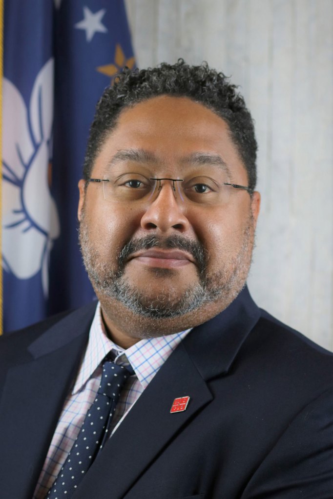 a professional headshot of a man