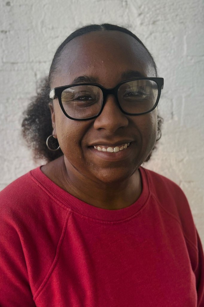 a headshot of a woman smiling