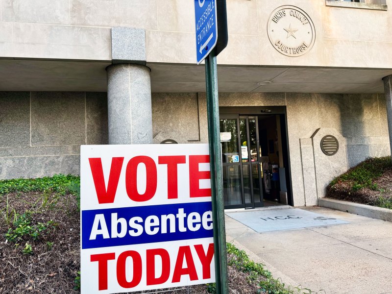 Sign outside of the Hinds County Courthouse that reads Vote Absentee Today