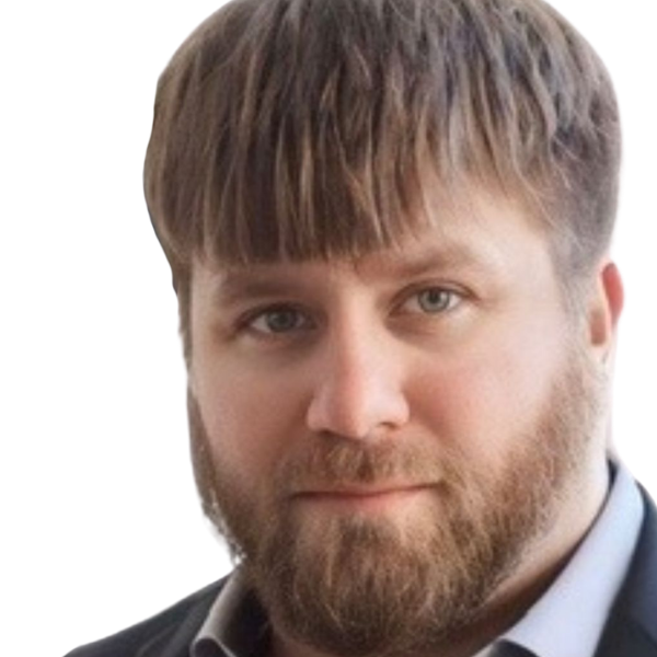 Closeup of a bearded man in a suit
