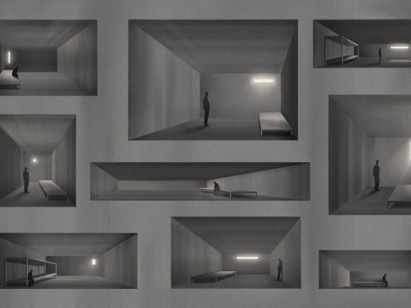 An illustration shows a grid of different jail cells with small or narrow windows, or no windows at all.