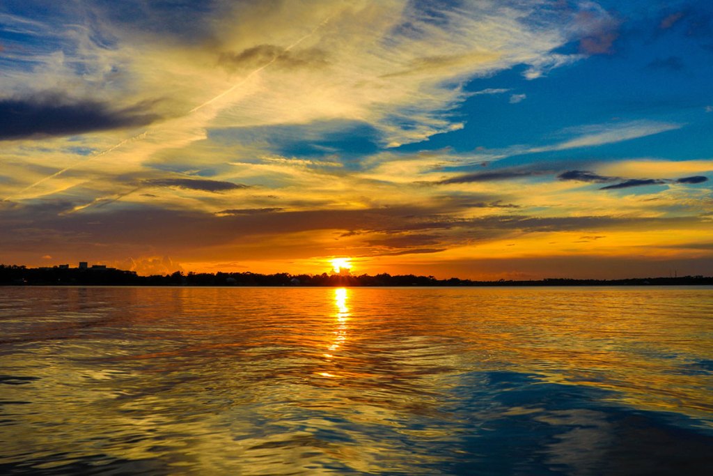 Calming waves at sunset in the Biloxi Back Bay