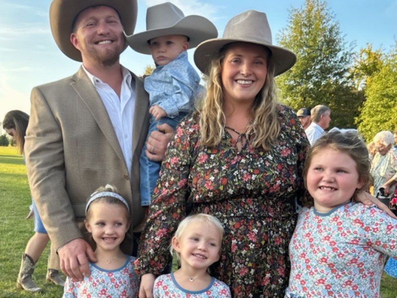 A family of six posed together