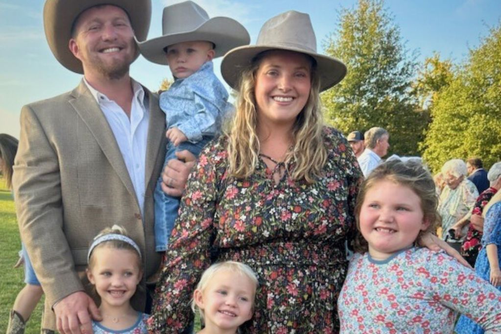 A family of six posed together