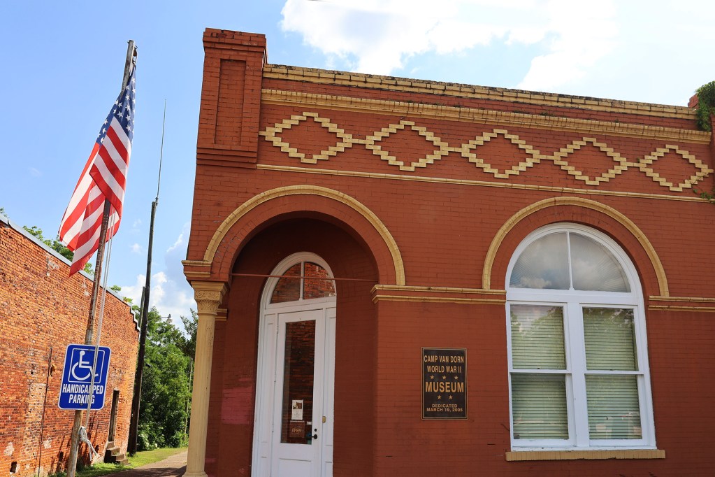 The exterior of the red brick building that houses Camp Von Dorn WW2 Museum
