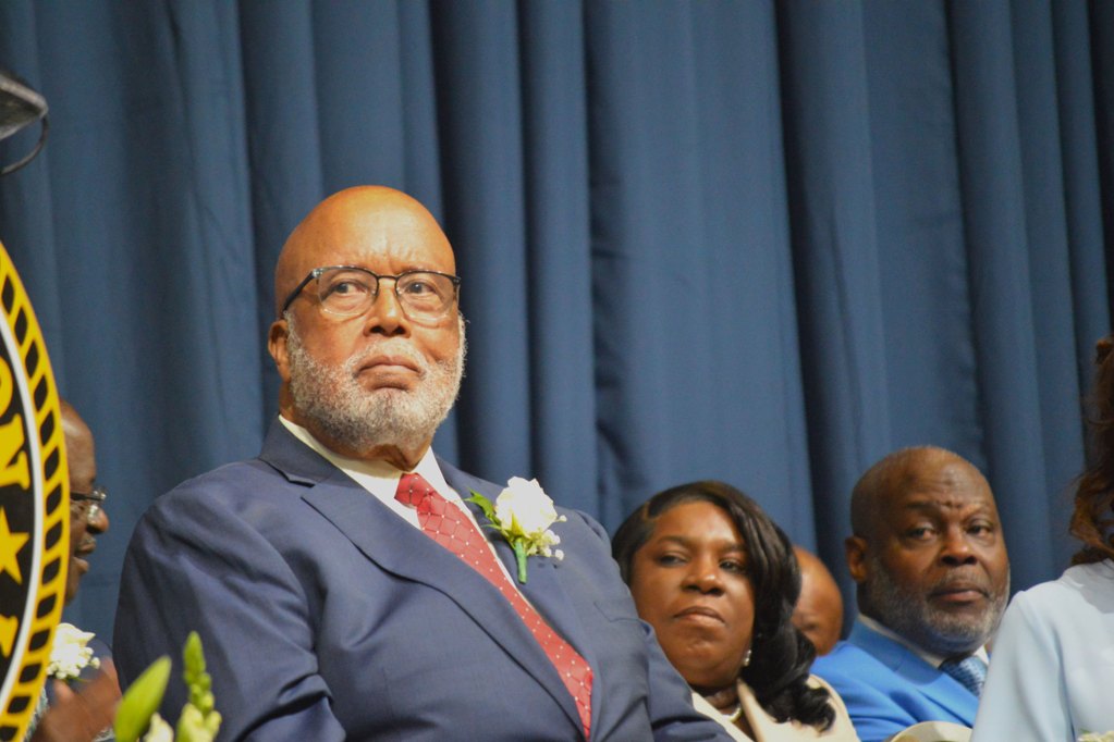 Bennie Thompson wearing a blue suit with a red tie