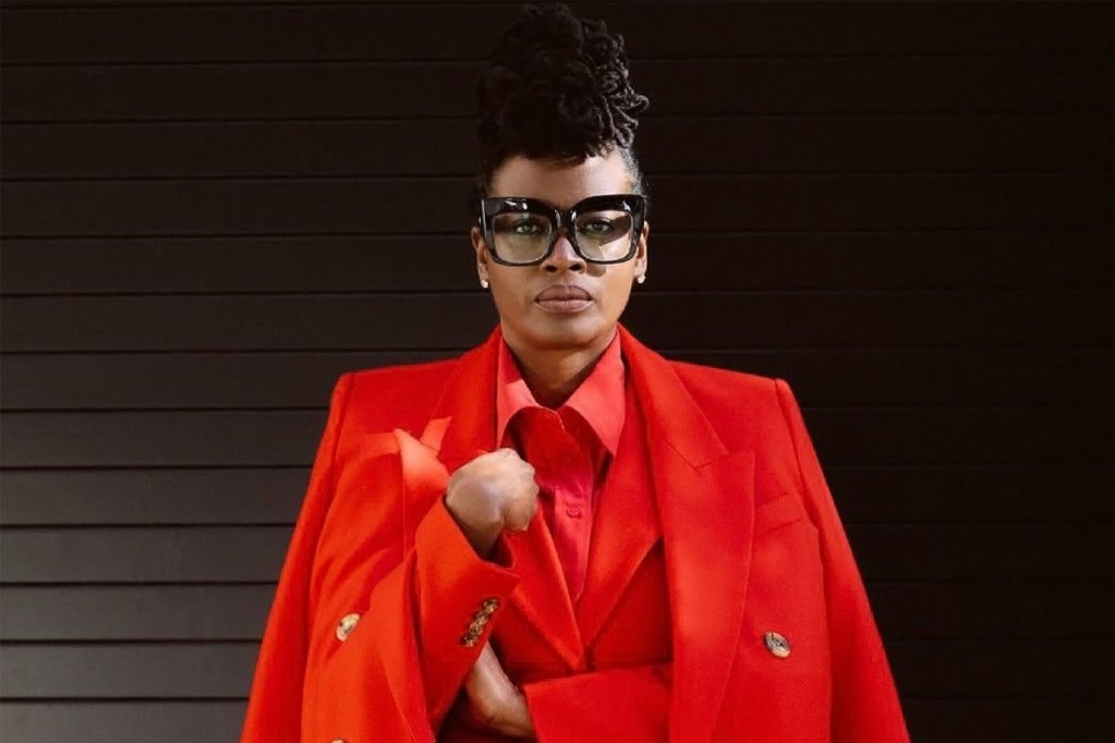 Cassandra Welchlin wearing all red with black glasses